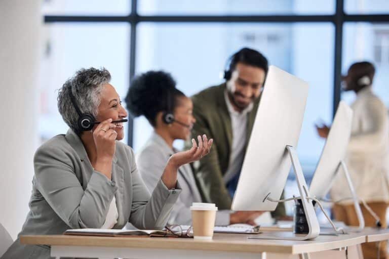 Call center, office team and woman with telemarketing communication, customer support and telecom s